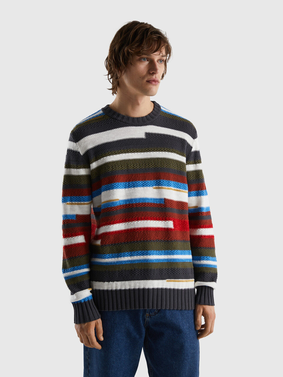Sweater with multicolored stripes