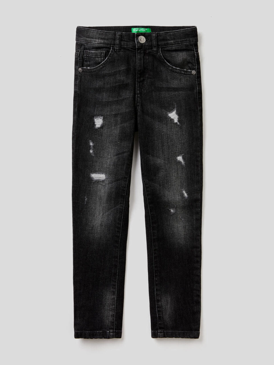 Skinny fit jeans with tears image number 1