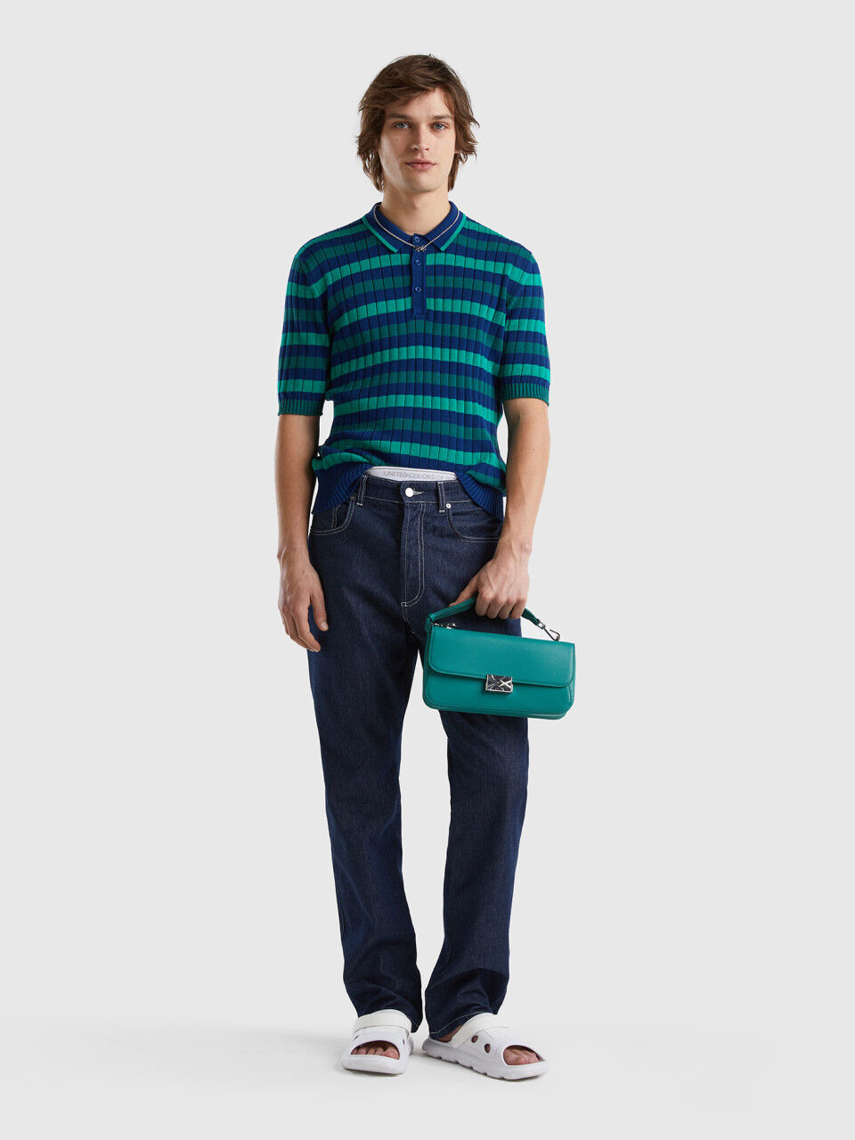 Green and blue striped knit polo