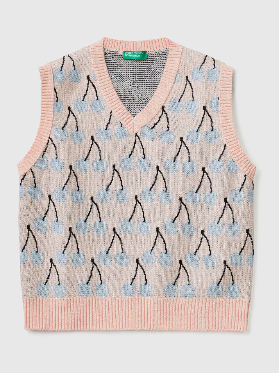 Pink vest with cherry pattern