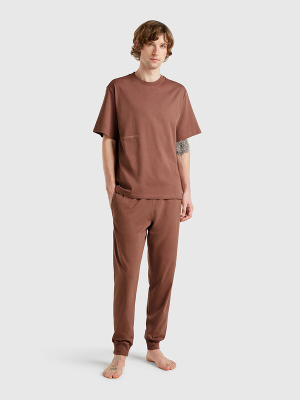 Trousers with elastic logo Men